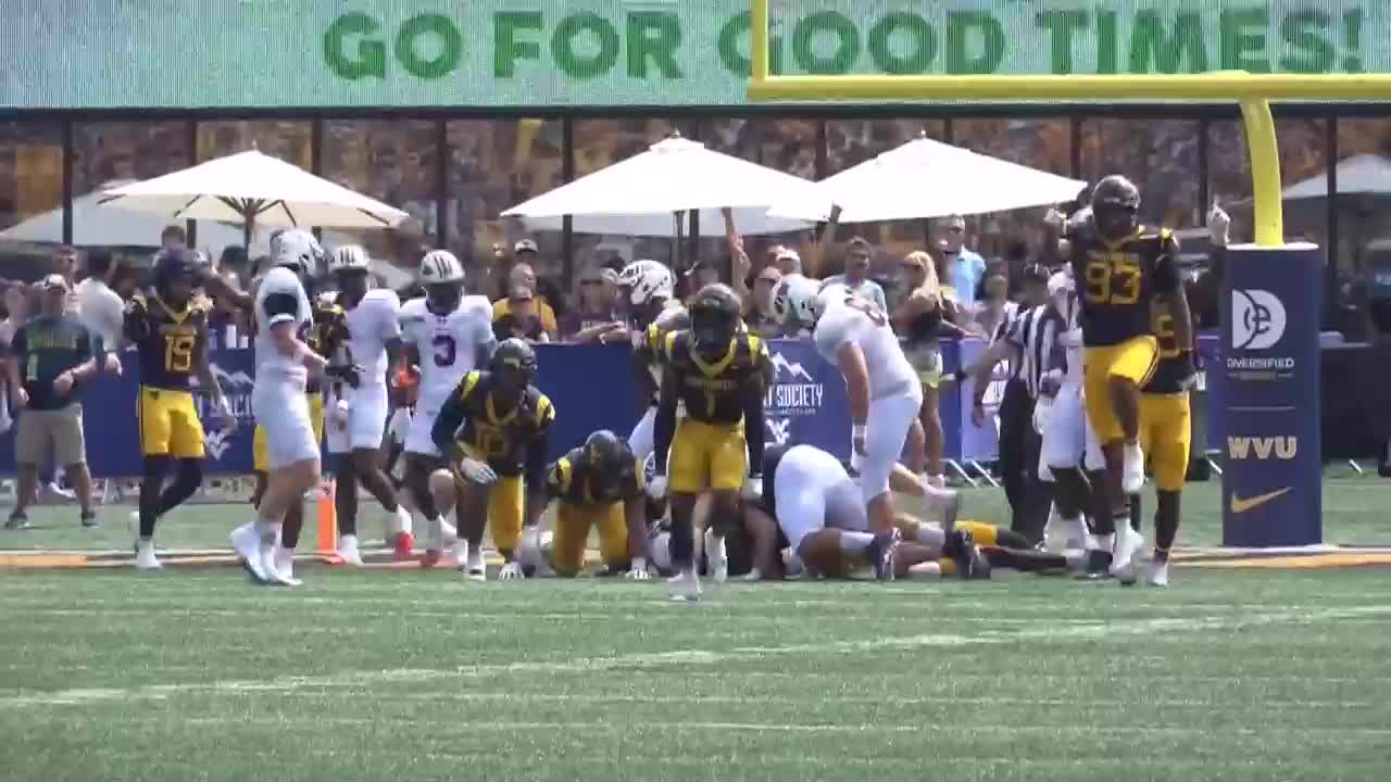 West Virginia University Football Team Loses Close Contest to Iowa State