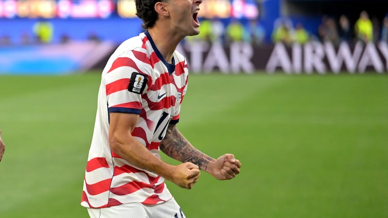 United States' Christian Pulisic celebrates after an own goal by Paraguay's Damian Bobadilla...