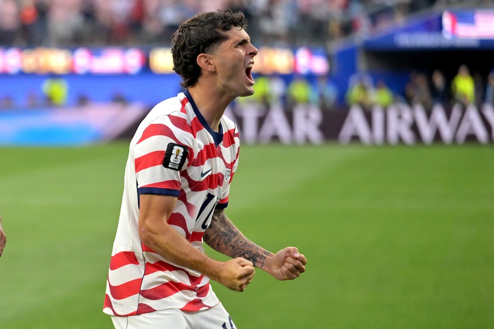United States' Christian Pulisic celebrates after an own goal by Paraguay's Damian Bobadilla...