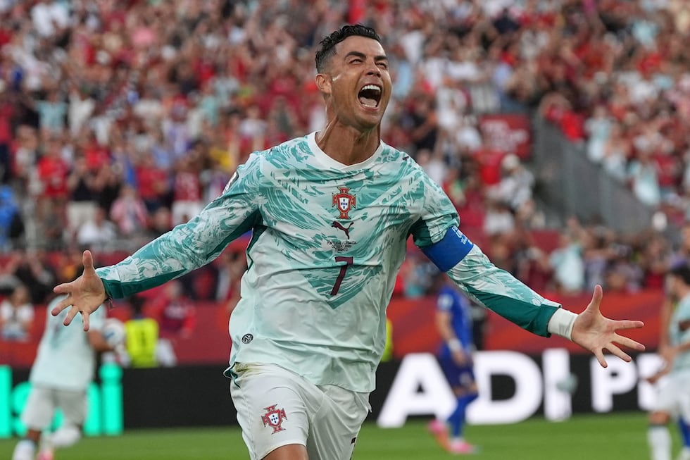Portugal's Cristiano Ronaldo (7) celebrates after scoring their opening goal during the World...