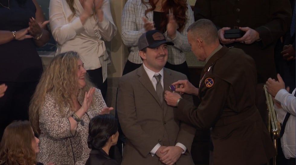 Air Force Staff Sgt. Andrew Wolfe, who survived a gunshot wound to the head while patrolling...