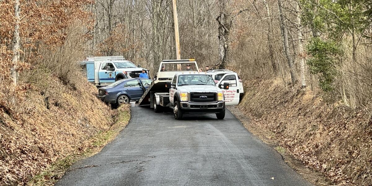 Two injured, road blocked in head-on collision