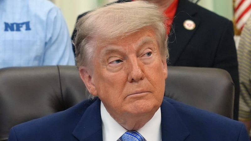 President Donald Trump attends an event about loosening a federal refrigerant rule, in the...
